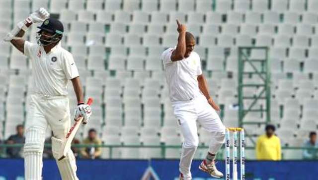 dhawan-early-dismiss-vijay-pujara-rebuild-innings-niharonline